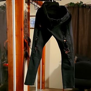 Black jeans with leopard print.